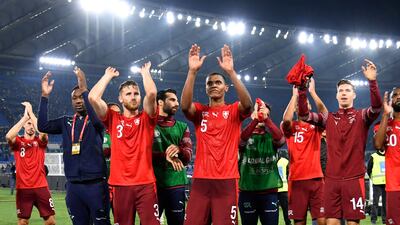 Switzerland's players acknowledge fans at the end of the match. AFP