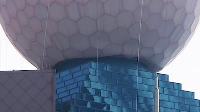 The structure atop the Etisalat building at the corner of Sheikh Rashid bin Saeed and Zayed the First streets was damaged during the heavy storm this week. Ravindranath K / The National