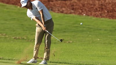 Denmark's Rasmus Hojgaard plays a shot on the ninth hole at Jumeirah Golf Estates. AFP