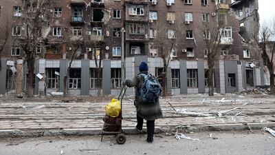 A badly damaged apartment block in an area controlled by Russian-backed separatists in Mariupol. AP
