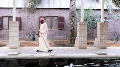 Khalid Khalifa Al Naboodah guides his horse on a morning swim.