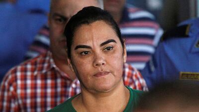 Former first lady Rosa Elena Bonilla de Lobo looks on while heading to court on corruption charges in Tegucigalpa, Honduras. REUTERS/Jorge Cabrera