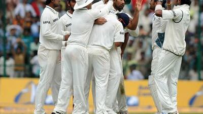 Zaheer Khan, centre, took the crucial wicket of Ricky Ponting, the Australia captain, yesterday.