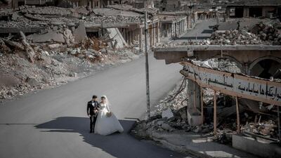 Despite the mass destruction that took place in the city of Sinjar when ISIS invaded the city in 2014, this Yazidi bride and groom have decided to celebrate their wedding in Sinjar. Photo by Sherwan Melhem
