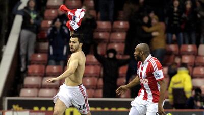 Stoke City's Oussama Assaidi, left, celebrates his late goal, which lifted his team to a 3-2 victory over Chelsea on Saturday. Lindsey Parnaby / AFP