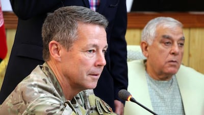 Austin Scott Miller (L), the US commander of Nato's Resolute Support Mission in the country, attends a meeting in which a Taliban militants opened fire and killed General Abdul Razzaq Dawood. EPA