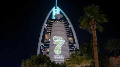 Dubai Municipality’s Car Free Day logo is projected on to the Burj Al Arab. Reem Mohammed / The National