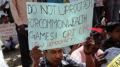 Protesters in New Delhi demonstrate against price increases of basic commodities created by the cost of the Commonwealth Games.