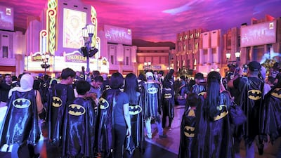 People wear capes to take part in helping set a new Guinness World Record for Batman’s 80th anniversary at Warner Bros n Abu Dhabi. Pawan Singh / The National