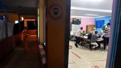 Algerian elections staff count ballots for parliamentary elections at a polling station in Bouchaoui, on the western outskirts of the capital Algiers. AFP
