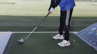 Emirati athlete Salma Al Salami from the Zayed Higher Organization for People of Determination, Abu Dhabi prepares to take a shot at the first-ever Special Olympics Topgolf Invitational Tournament for People of Determination in the region, at the Emirates Golf Club in Dubai. Photo: Special Olympics UAE