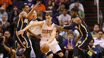 Goran Dragic, centre, had 21 points for the Suns on Wednesday. Christian Petersen / Getty Images / AFP