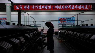 A North Korean woman works at a silk factory in Pyongyang, North Korea. EPA