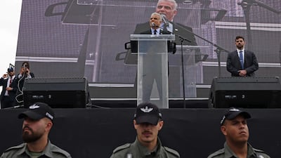 Opposition leader and former prime minister Yair Lapid speaks outside the parliament in Jerusalem. AFP