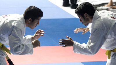 Boys fight as they compete in the Abu Dhabi National Schools Championship on Thursday, May 21, 2015, at the Du Forum hall on Yas Island in Abu Dhabi. Silvia Razgova / The National