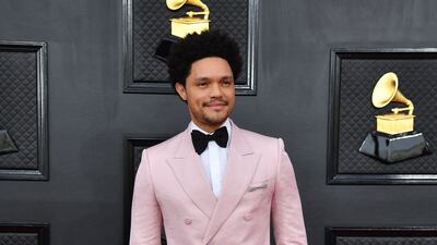 South African comedian Trevor Noah chose a lighter shade of pink for his tuxedo. AFP