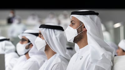 Sheikh Mohamed bin Hamad bin Tahnoon, adviser for Special Affairs at the Ministry of Presidential Affairs (R), attends the lecture at Majlis Mohamed bin Zayed.