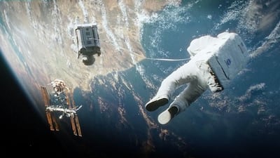 While the film Gravity took artistic licence with its space junk scenes, orbiting debris a real and growing problem for the future of the space industry. AP / Warner Bros Pictures