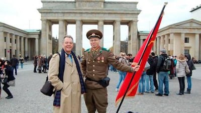 Bill Davey with the fake Russian soldier, in front of the Brandenberg Gate, without the bronze horses on top.