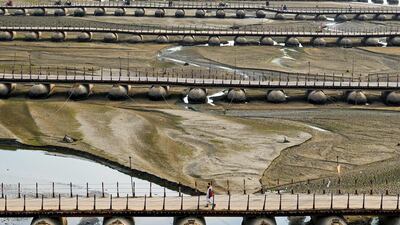 Vacant pontoon bridges near Sangam, the confluence of Ganges, Yamuna and mythical Saraswati rivers, at the end of the Maha Kumbh Mela festival in Prayagraj, India. AFP