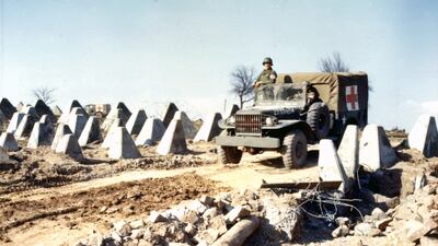 An American WC51 Dodge medic truck on a bulldozed road through rows of 'dragon's teeth' on the Siegfried Line (also known as the West Wall), 1945. The so-called teeth were concrete structures a little more than a metre tall and designed to impede tank movements. Getty Images