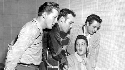 Left to right: Jerry Lee Lewis, Carl Perkins, Elvis Presley and Johnny Cash in 1956 at Sun Studios in Tennessee. The impromptu jam session resulted in an album titled The Million Dollar Quartet. Michael Ochs Archives / Getty Images