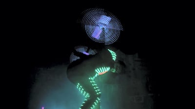 Al Dhahery combines eccentric dance moves with slick circus tricks. Photo: Reem Mohammed / The National