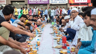 Iftar meals distributed at the New Fatima Mosque adjacent to the Al Ghubaiba Bus Station in Bur Dubai. Antonie Robertson / The National