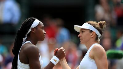 Simona Halep, right, shakes hands with Cori Gauff after defeating the American teenager in the fourth round at Wimbledon. PA Photo
