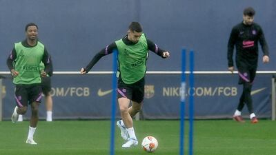 Barca midfielder Ansu Fati, left, and forward Ferran Torres. AFP