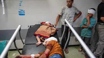 Wounded Palestinians and their relatives await treatment at Nasser Hospital in the south-eastern district of Khan Younis. AFP