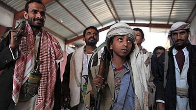 Yemeni tribesmen, loyal to an opponent of outgoing President Ali Abdullah Saleh, oyal to a tribal rival of outgoing Yemeni President Ali Abdullah Saleh, gather ahead of their withdrawal from a government office in Sanaa.