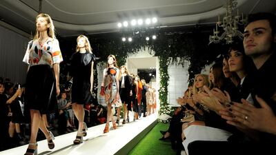 Juno Temple, Brit Marling, Lea Seydoux, Rebecca Hall, Alexa Chung and Douglas Booth attend the Mulberry Spring/Summer 2014 show during London Fashion Week at Claridge's Hotel, London on September 15, 2013. Photo by David M. Benett / Getty Images