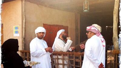 Day trip with friends to the Western Region and the Mazayin Dhafra Camel Festival, 220 kms west of Abu Dhabi on December 20, 2013. Men enjoy coffee outside of the date competition stand. Picture taken with the Hipstamatic app for the iPhone. Liz Claus / The National