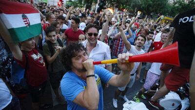 Hungarian fans celebrate after the Euro 2016 Group F match against Iceland in Budapest, Hungary, 18 June 2016. EPA/ZOLTAN BALOGH