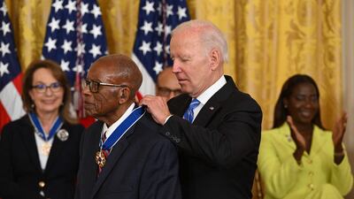 Mr Biden awards civil rights lawyer Fred Gray. AFP
