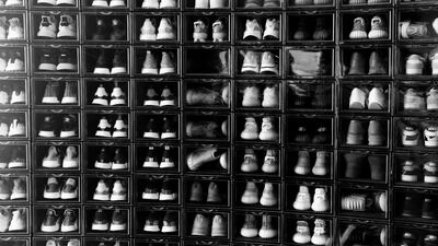 Al Safar displays his prized possessions in the living room, neatly lined up in transparent boxes, shielded from dust and direct sunlight. Reem Mohammed/The National