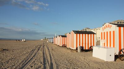 Striped seaside huts in De Panne on the coast of Belgium. Photo: John Brunton