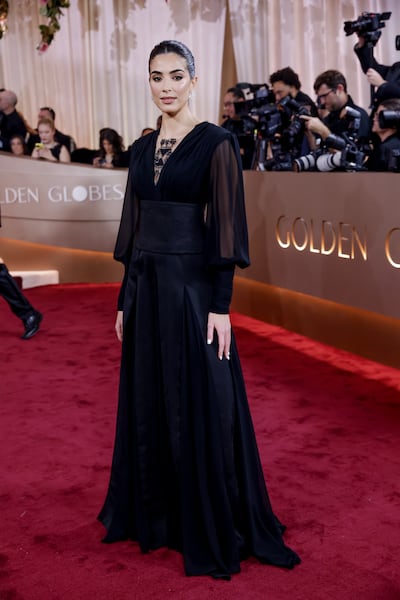 Saja Kilani wears a dress that celebrates her Palestinian heritage. EPA