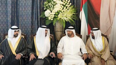 Sheikh Mohamed bin Zayed attends the wedding reception of Hamad Al Ameri (2nd L) and Mansour Al Ameri (L), at the Armed Forces Officers Club. Seen with Mohamed Al Ameri (R). Hamad Al Kaabi / Ministry of Presidential Affairs
