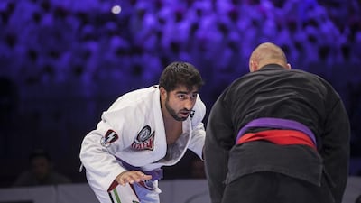Yahia Mansour stares down Sebastian Szyszka during their open weight purple master final at the Abu Dhabi World Professional Jiu-Jitsu Championship on Saturday. Mona Al Marzooqi / The National