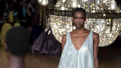 The sequins are standard, but the loose shape is new for Halpern. EPA
