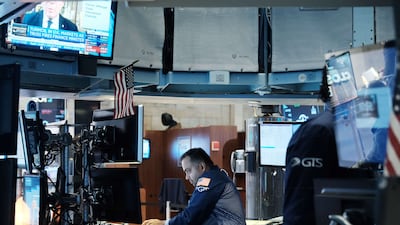 Traders on the floor of the New York Stock Exchange. Analysts expect third-quarter earnings per share growth for energy companies of 121 per cent compared with the same period a year ago. AFP