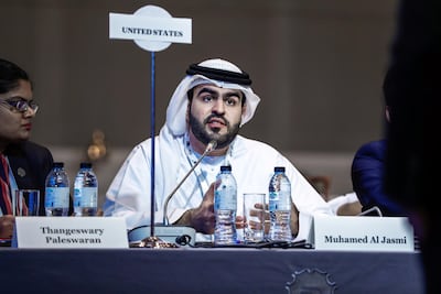 A negotiator speaks to the council during the war game. Victor Besa / The National