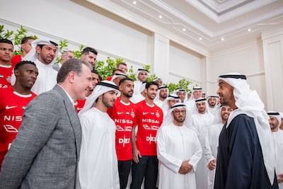 President Sheikh Mohamed with members of the Shabab Al Ahli team. Photo: UAE Presidential Court