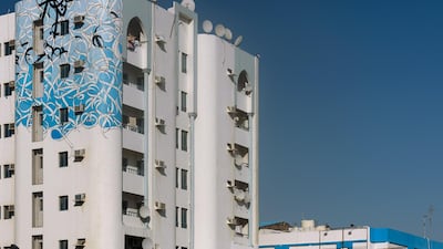 El Seed's Ajman mural joins major works by the artist in Paris, New York, Melbourne and Cairo. Courtesy: Christindim