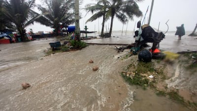 Floodwaters rise over the coastal road as Tropical Storm Pabuk approaches, in Pak Phanang, in the southern province of Nakhon Si Thammarat, southern Thailand. AP Photo