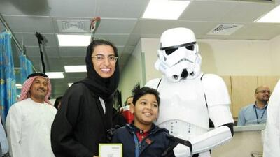 Twofour54 CEO Noura Al Kaabi and three Star Wars Stormtroopers paid a visit to children at Sheikh Khalifa Medical City in Abu Dhabi. Courtesy of twofour54