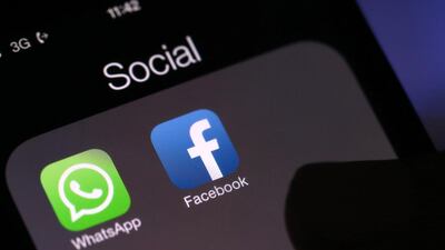 WhatsApp last month revised its privacy policy to let the Facebook-owned app share data with its parent firm. Chris Ratcliffe / Bloomberg