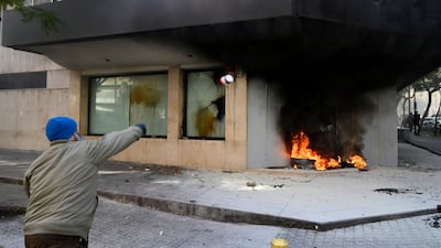 A FransaBank branch in the Badaro neighbourhood was also set on fire during the protest. EPA